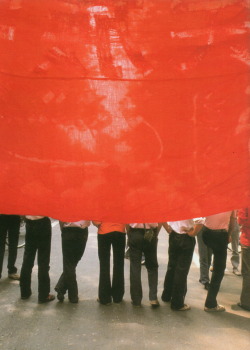 zoku: a group of students behind their bannersTiananmen Square,