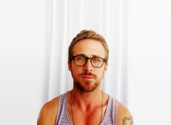  Gosling came to the table, lanky in a striped tank top, surprising