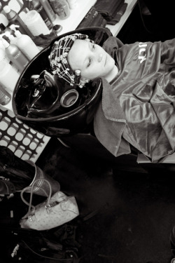 John is ashamed at his first perm in the salon.