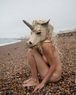 (via Magical Naked Unicorn Head Girl On Beach - Geekologie)
