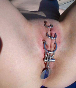 pussymodsgalore:  You won’t get in there! Chastity piercing.