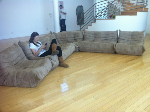 I bought the couch that my latest WeLiveTogether scene was shot on. I love my new couch. :)