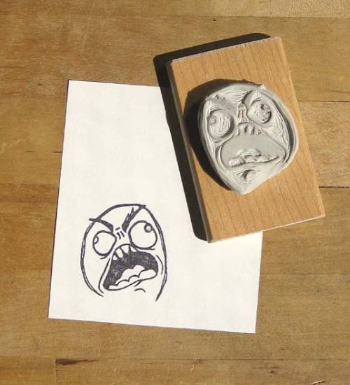 amorningcupofjo:  RAAAAAAAAAAGE!! Hand-carved stamp by Extase. :P  I think this is going on the list of ‘things I need in my life’.