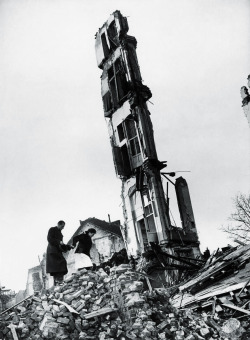 civilians threading their way through the ruins of Cologne photo