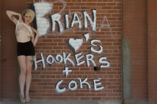 alysha:  i wish i knew someone named brian.  The super awesome Alysha Nett in a fun and sexy shot next to a rather interesting graffiti sign, lol check her out! she’s gorgeous, and super nice! â™¥