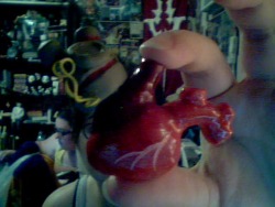 Heart is finished and glossed. Charge thingy is almost done.Dunno