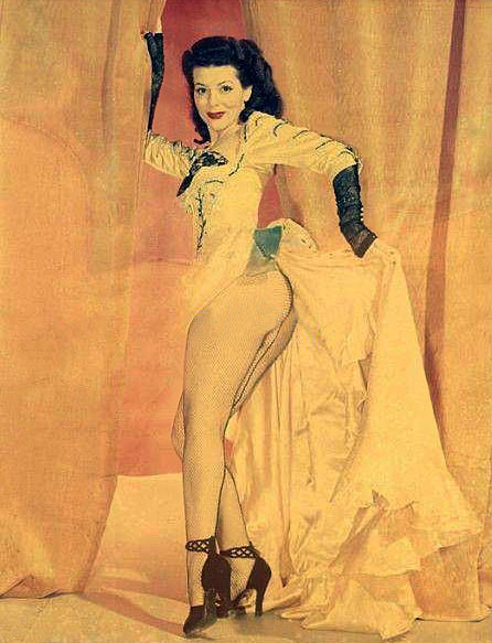 Vintage hand-tinted photo of bawdy showgirl: Rose La Rose.. aka. “The Undisputed Queen Of Burlesque”..