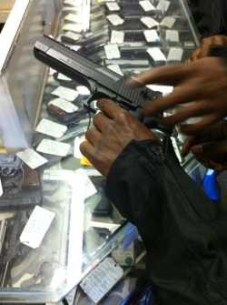 .50 desert eagle…heavy as fuck. When them clowns have