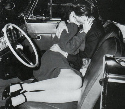  A couple making out at the Drive-In movie theater. Ohio, 1950s