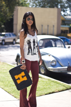 teenvogue:  Fashion Click blogger Sheryl looked back-to-school cool with her maroon jeans and varsity letter laptop case. Find out how you can get her look here » 