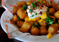 Are these tater tots with cheese and sour cream and chives? OMFG.