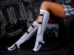 aswimmingelegy:  Want these so badly. Portal 2 long fall socks.
