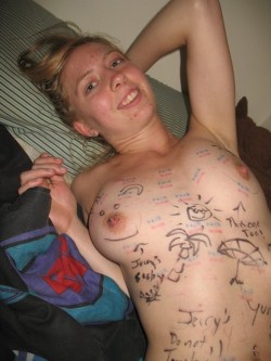 girlswithsigns:  another girl completely covered in boy graffiti,