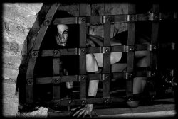 templeofbabalon:  Who doesn’t want a caged animal in the cellar? 