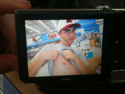 lolbloggers:  Keegan found this on a camera at Wal-Mart   god