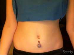 wannabenudist:  new belly button ring :)  it’s freezing today,