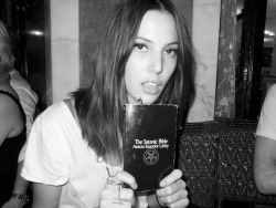 terrysdiary:  Ruby Aldridge at Cafe Flore holding her copy of