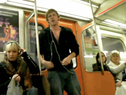  Sexy guy strips shirtless in the tube. 
