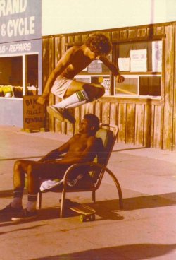 lonesomelacowboy:  A skateboarder named Mike Kolar jumping a