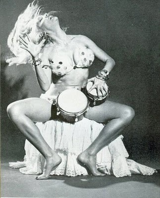 Lilly Christine goes wild on her bongo drums..