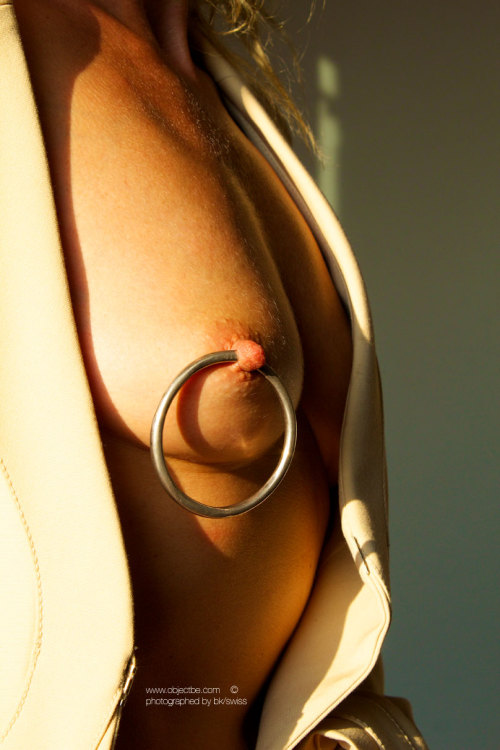 love this gauge nipple piercing! awesome ring too!