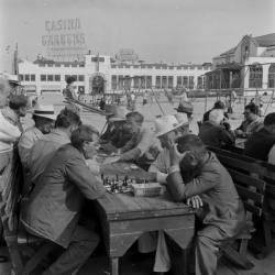 legrandcirque:Men playing chess on the beach. Photograph by John