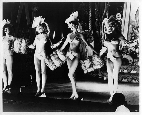 A 50’s-era chorus line takes center stage at the ‘FOLLIES Theatre’ in Los Angeles..