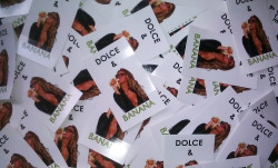 Pile of Dolce & Banana stickers.