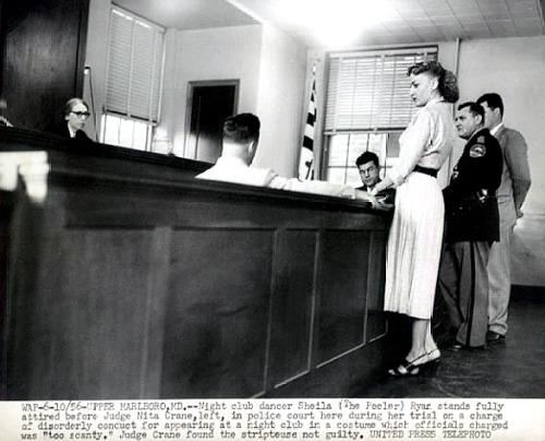 Sheila “The Peeler” Ryan A press photo showing a June 1956 police court appearance by Ms. Ryan, where she faced disorderly conduct charges for wearing a burlesque costume deemed “too scanty” by Upper Marlboro (Maryland) vice office