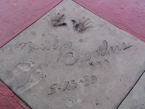 May 23, 1980: At the premier of Insatiable, placing hand and foot prints in cement outside the Pussycat Theatre, Santa Monica Blvd., West Hollywood, CA. (Footage featured on 30th anniversary DVD of Insatiable.)