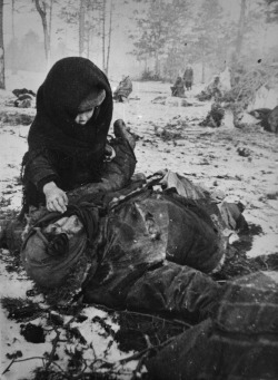 agalloch:  Soviet child next to dead mother. Concentration camp