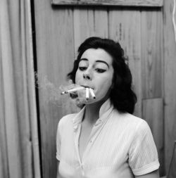 vermillons:  Smoking four cigarettes at once. From a series of