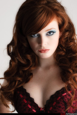 A beautiful bra, and lovely redhead, perhaps her hair color is