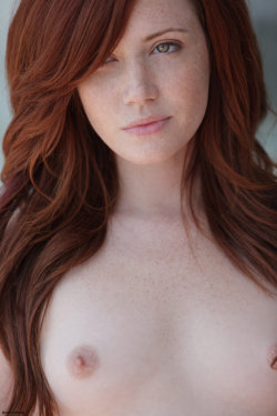 voyeurgasm:  Sexy redhead Elle Alexandra topless.