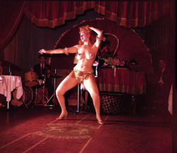  Lynne O’Neill loses herself in the rhythm of her dance.. Whilst appearing at ‘Georgia’s Blue Room’, somewhere in NYC during the 1950’s.. 