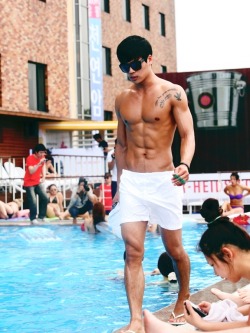 boys-pleasure:  Hot Asian is HOT! Somebody pull his trunks down