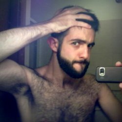 Seriously cute hairy guy. Love the smirk, you look very playful.