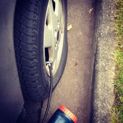 Unhappiness is finding you have a flat tire (Taken with instagram)