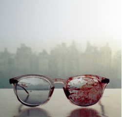 coyotesaint:  John lennons’s glasses after he was shot in 1980. 