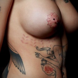 mrmrswoodman:  krazyraybodymods:  bondagefairy:  i really seriously think about getting my nipples tattooed.   Nice nipples but I really like the scars, they add a lot to her look.  Want to submit your own pic for me to post here? http://mrmrswoodman.tumb