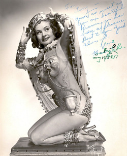 burleskateer:     Baby Lake was a popular showgirl at NYC’s famed ‘LATIN QUARTER’ nightclub.. She appears here, wearing (perhaps) the oddest dance costume I’ve yet seen! A vintage promo photo personalized to a fellow dancer on May 17, 1951: “To