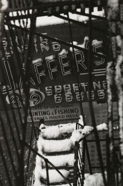 liquidnight:  W. Eugene Smith Untitled [neon sign through snow-covered