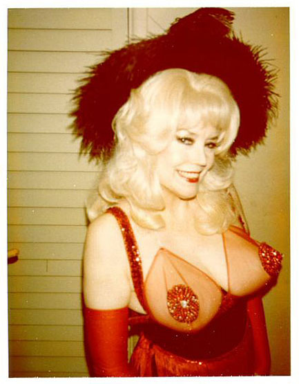  Color polaroid of a late-period Evelyn West.. Then, performing wearing a blonde wig? 