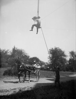 S. M. Chubb photographing a horse