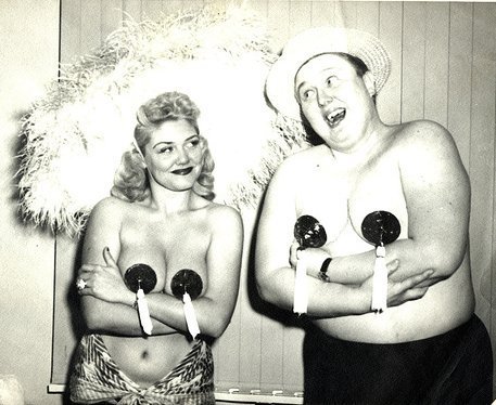 Longtime Carnival Circuit comedian Tubby Boots compares his man-boob tassels to those of “The Bazoom Girl”, herself: Jennie Lee..