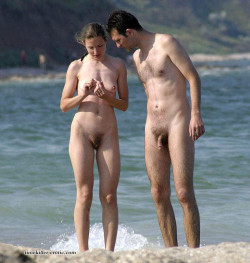 nudistlifestyle:  Nudist couple at the beach. I think she has