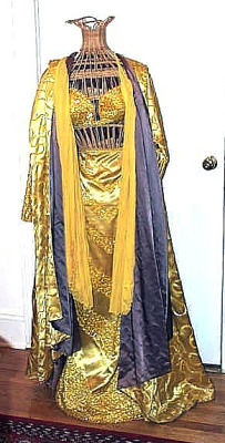 This golden-caped outfit was one of the more elaborate dance costumes worn by legendary stripper: Winnie Garrett..