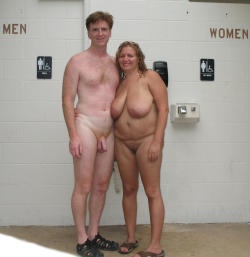 nudistlifestyle:  Naturist couple pose outside changing rooms