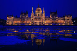 sav3mys0ul:  The Hungarian Parliament building is reflected on