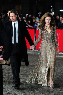suicideblonde:  Brad Pitt and Angelina Jolie (wearing Salvatore